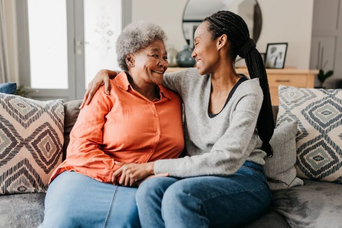 Senior woman talking with her daughter; mini stroke