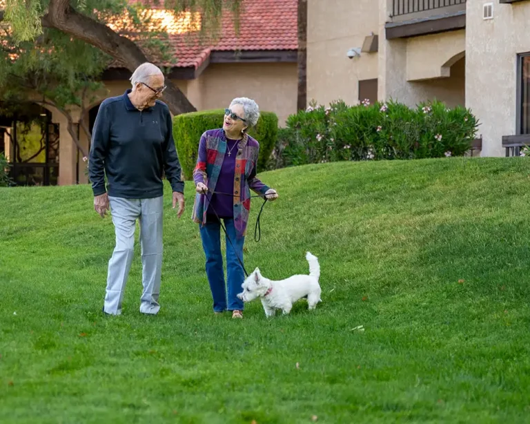independent living photo, couple walking dog